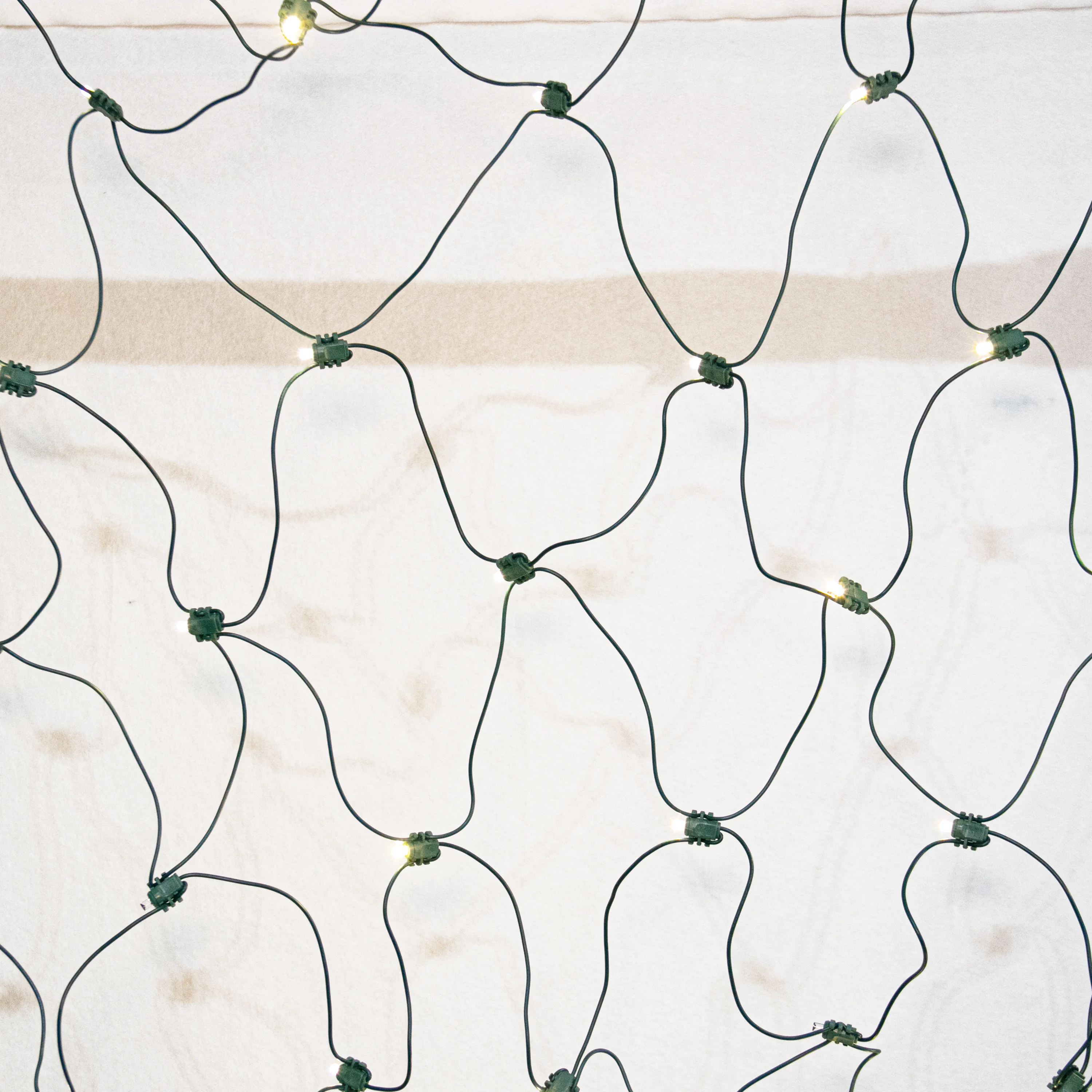 Warm White (sun) Mini Net Lights, Green Wire, (70 bulbs, 4" spacing)